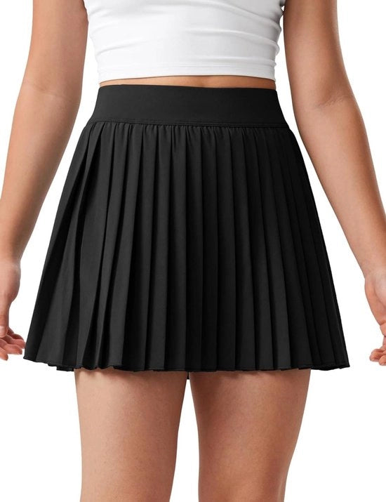 Rok con shorts piegati per bambine, ideale per tennis, atletica e scuola, con tasche