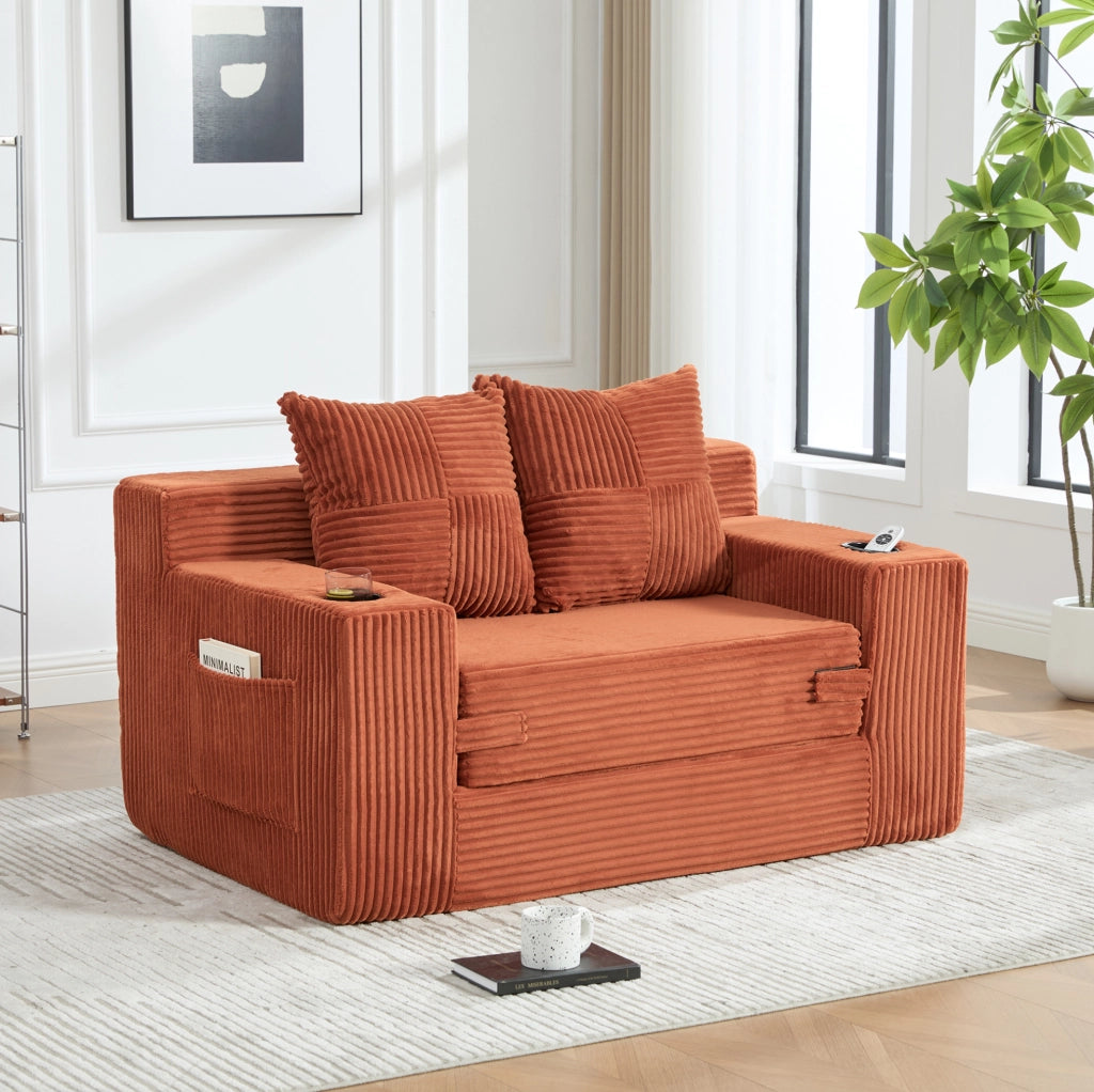 Divano pouf in velluto a coste arancione con tasche laterali e 2 cuscini