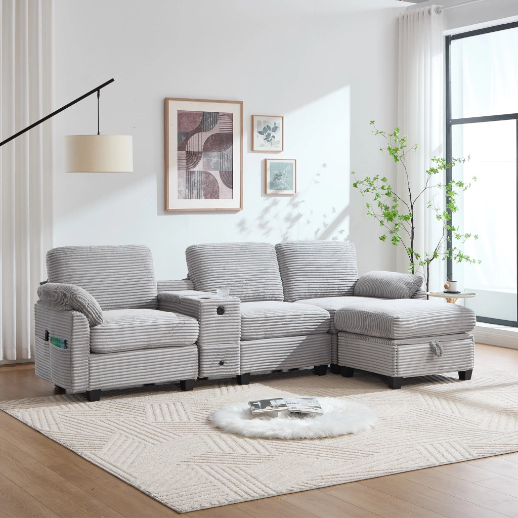 Divano ad angolo in cord con console scorrevole, porta USB-C, tasche laterali e pouf contenitore grigio chiaro