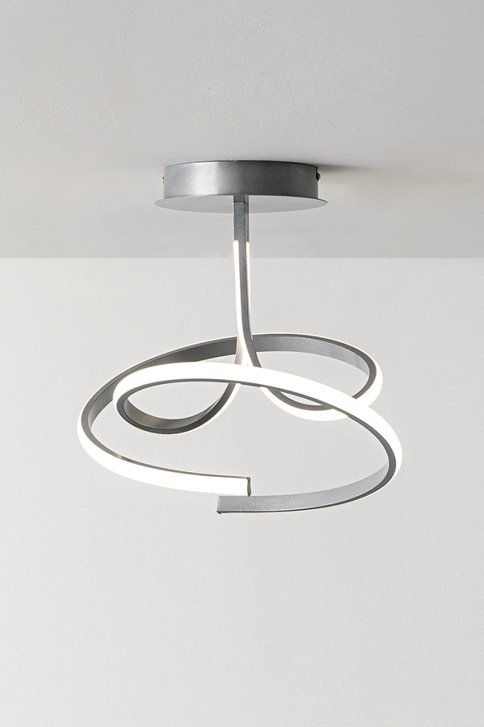 Curvy - Applique LED 12W 3000K IP20 con struttura in alluminio finitura nero opaco, design sinuoso e tondeggiante - Rossini Group