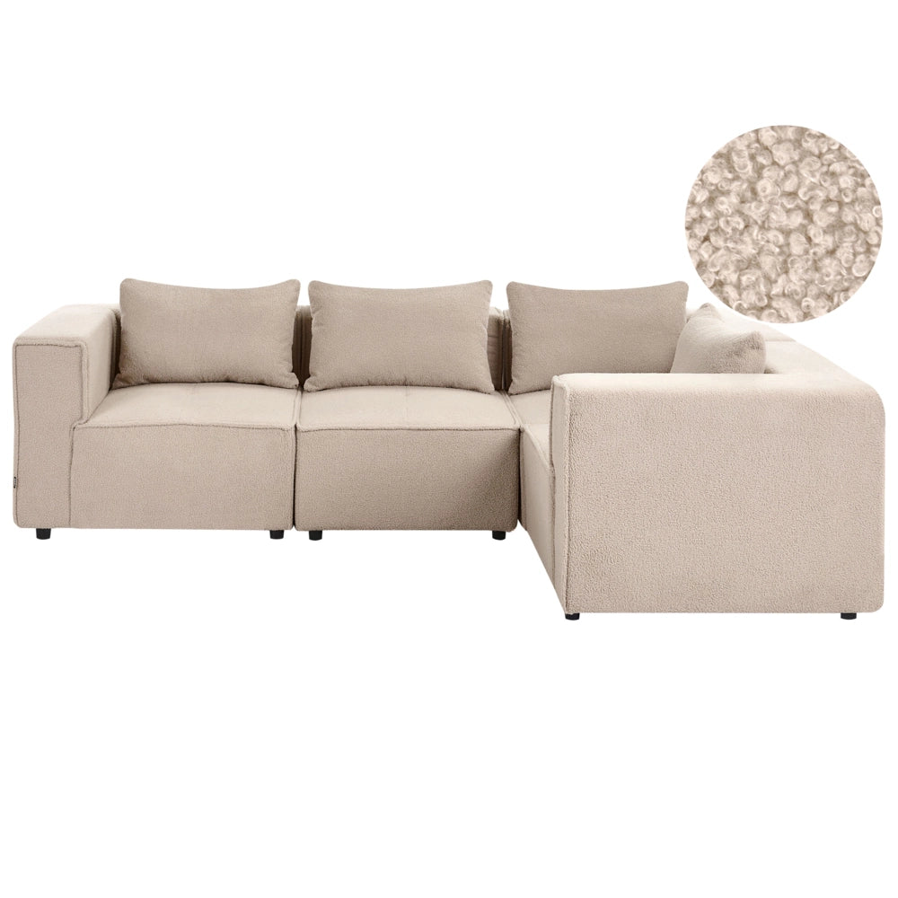 Divano a 4 posti in tessuto bouclè modulare beige lato sinistro stile minimale moderno