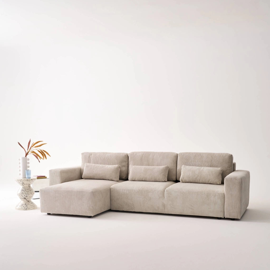 Divano letto angolare reversibile con contenitore in velluto a coste,