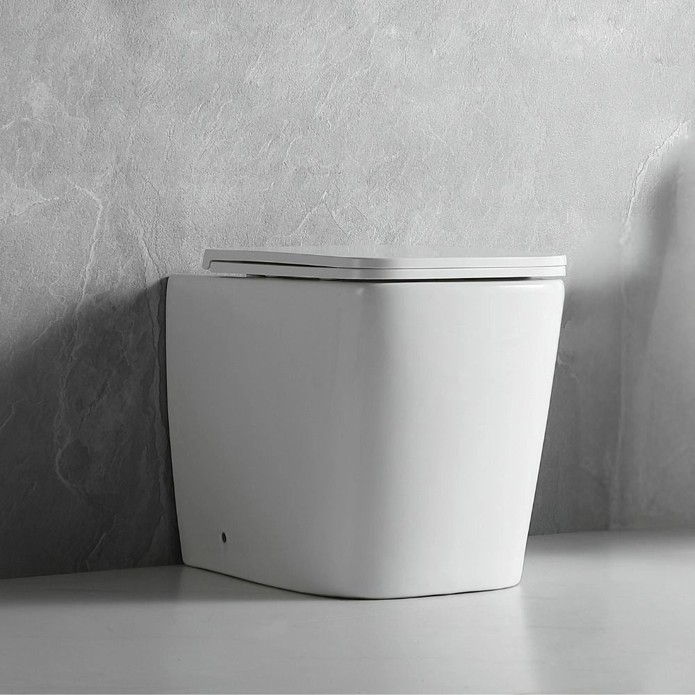 WC a pavimento bianco lucido filo muro scarico a parete FT54D