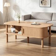 Tavolino da caffè 110×55×45 cm in MDF, design scandinavo con porta scorrevole, vani aperti e portata fino a 60 kg