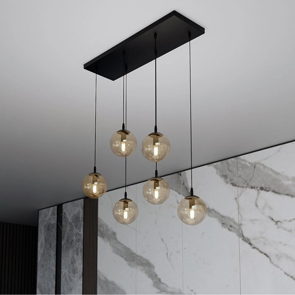 Lampada a sospensione Cosmo in acciaio nero con diffusori in vetro ambrato