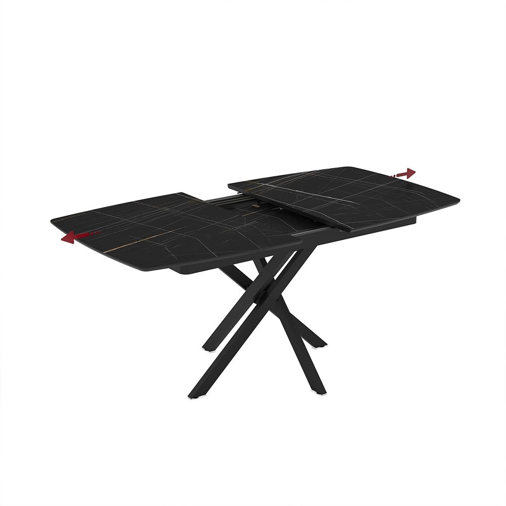 Tavolo allungabile Filis con piano effetto marmo nero con dettagli oro matt e gambe in metallo nero