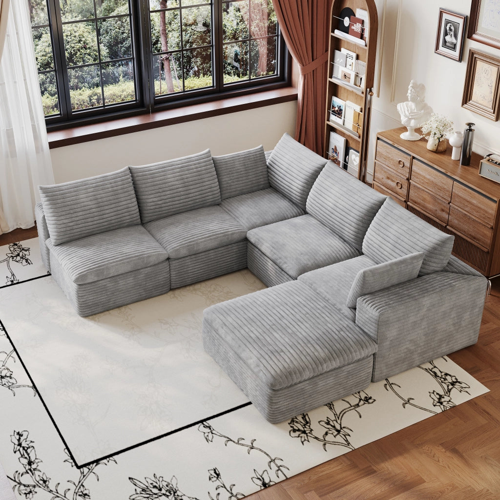 Divano modulare in tessuto grigio con imbottitura in schiuma e design componibile