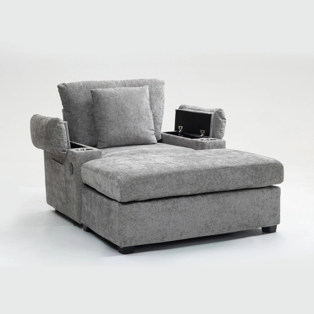 Poltrona reclinabile in chenille grigia con portabicchieri e vani laterali, con cuscino schienale e cuscino decorativo