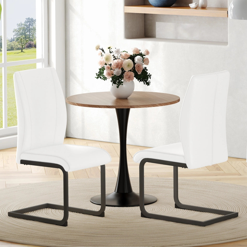 Sedia da pranzo in ecopelle bianca con schienale ergonomico e gambe in metallo nero