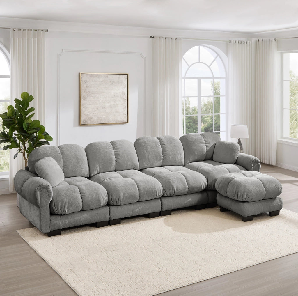 Divano angolare modulare a L 4 posti con pouf mobile 330x149x90 cm in chenille grigio chiaro
