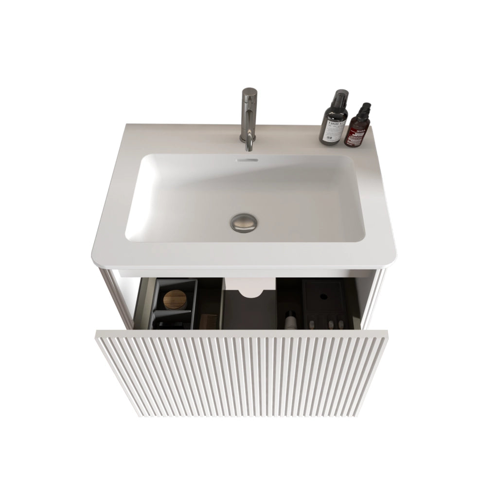 Mobile bagno sospeso ULEVR 60 cm con lavabo in solid surface, cassetto push-to-open e design scanalato bianco