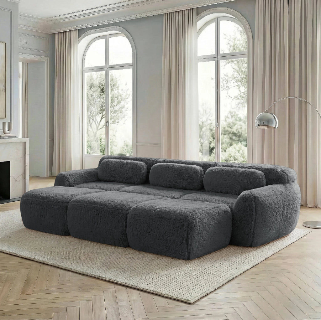 Divano modulare angolare 291x179x73 cm in tessuto peluche grigio; senza montaggio