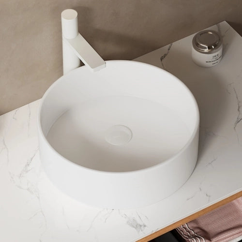 Lavabo da appoggio rotondo in ceramica bianca lucida; vasca monoblocco per piani e mobili da bagno