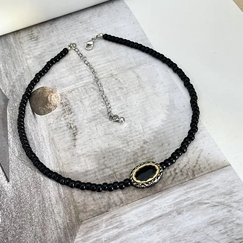 Collana vintage barocca con perline nere e oro, regalo di Natale o compleanno.