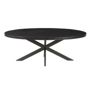 Tavolo da pranzo ovale BOURGIA in legno massiccio di Mangolia nero, ideale per una sala da pranzo accogliente.
