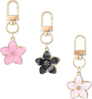 Tre pezzi di pendenti da chiave ornamentali floreali ombreggiati - rosa bianco e nero bianco