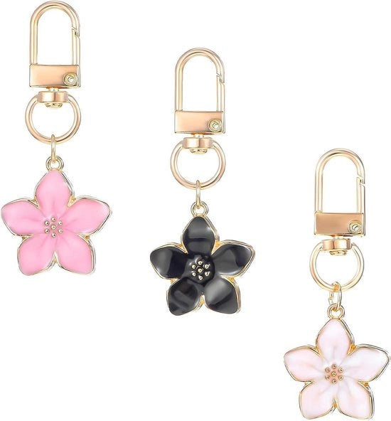Tre pezzi di pendenti da chiave ornamentali floreali ombreggiati - rosa bianco e nero bianco