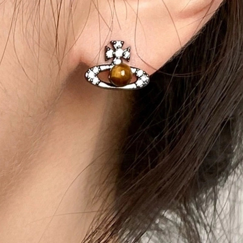 Orecchini a spillo in argento S925 dallo stile dolce e raffinato; orecchini a lobo con occhio di tigre in cristallo nero.