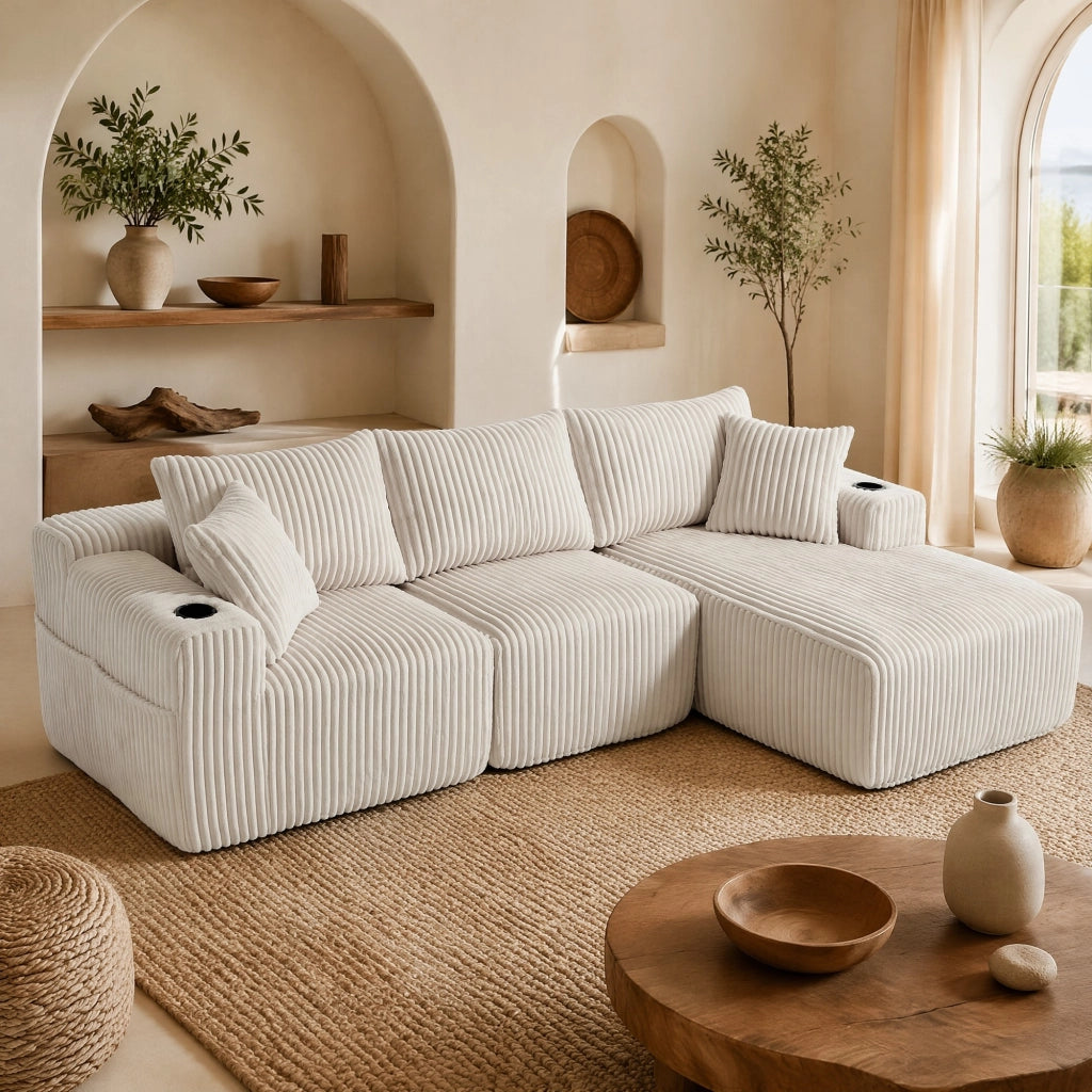 Divano modulare beige con penisola, velluto a coste, 5 cuscini e portabevande laterali