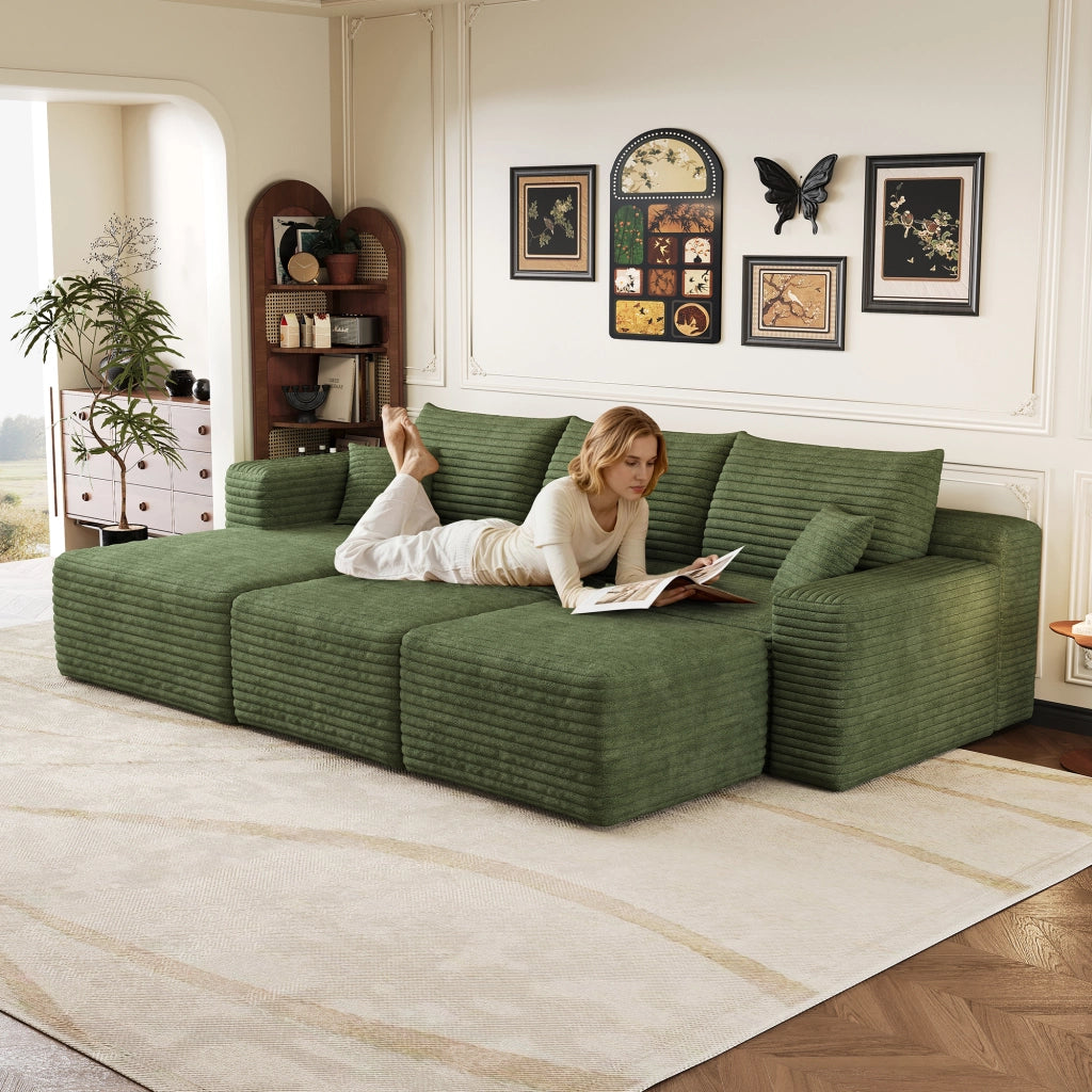 Divano angolare modulare senza montaggio in velluto a coste, seduta profonda e design minimal, verde