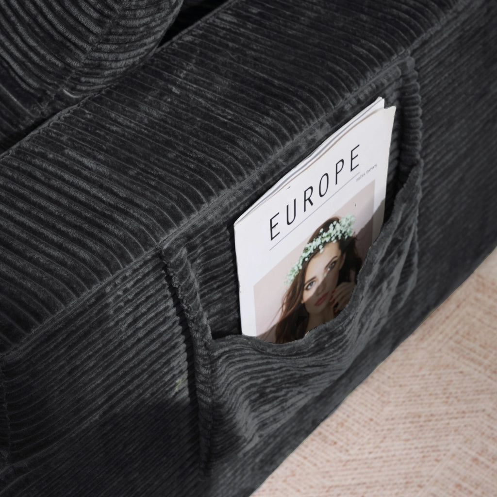 DIVANO in corduroy nero con tasche laterali e cuscini