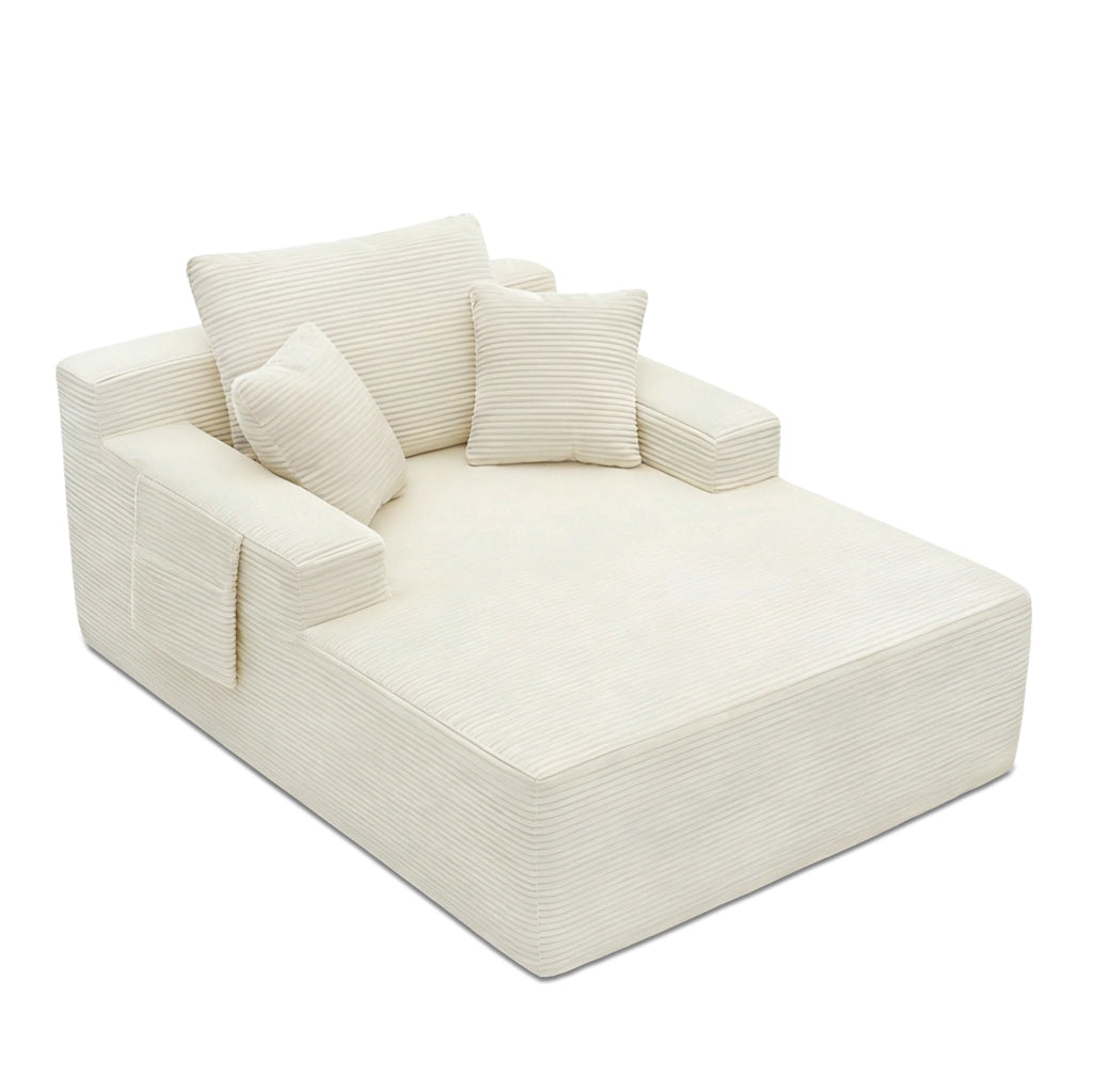Divano compatto in cord beige con tasche laterali e cuscini