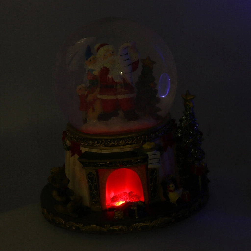 Palla di vetro con Led in Resina babbo natale con musica cm Ø16,5xh20