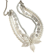 Collana girocollo con fiore di cristallo e perla satinata