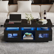 Tavolino da caffè nero lucido 100×50×43 cm con LED; presa UE; USB e mobiletto