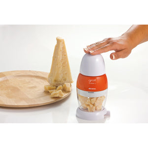 Grattugia elettrica con dosatore da tavola, lama acciaio inox, coperchio salvafreschezza - Arancione