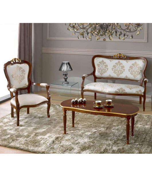 Divanetto imbottito in legno massello intagliato con fregi oro