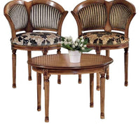 Tavolino ovale da salotto in legno intagliato con fregi