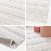 Tappeto interno con archi color crema