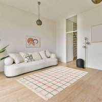 Tappeto interno shaggy motivo a griglia multicolore con frange