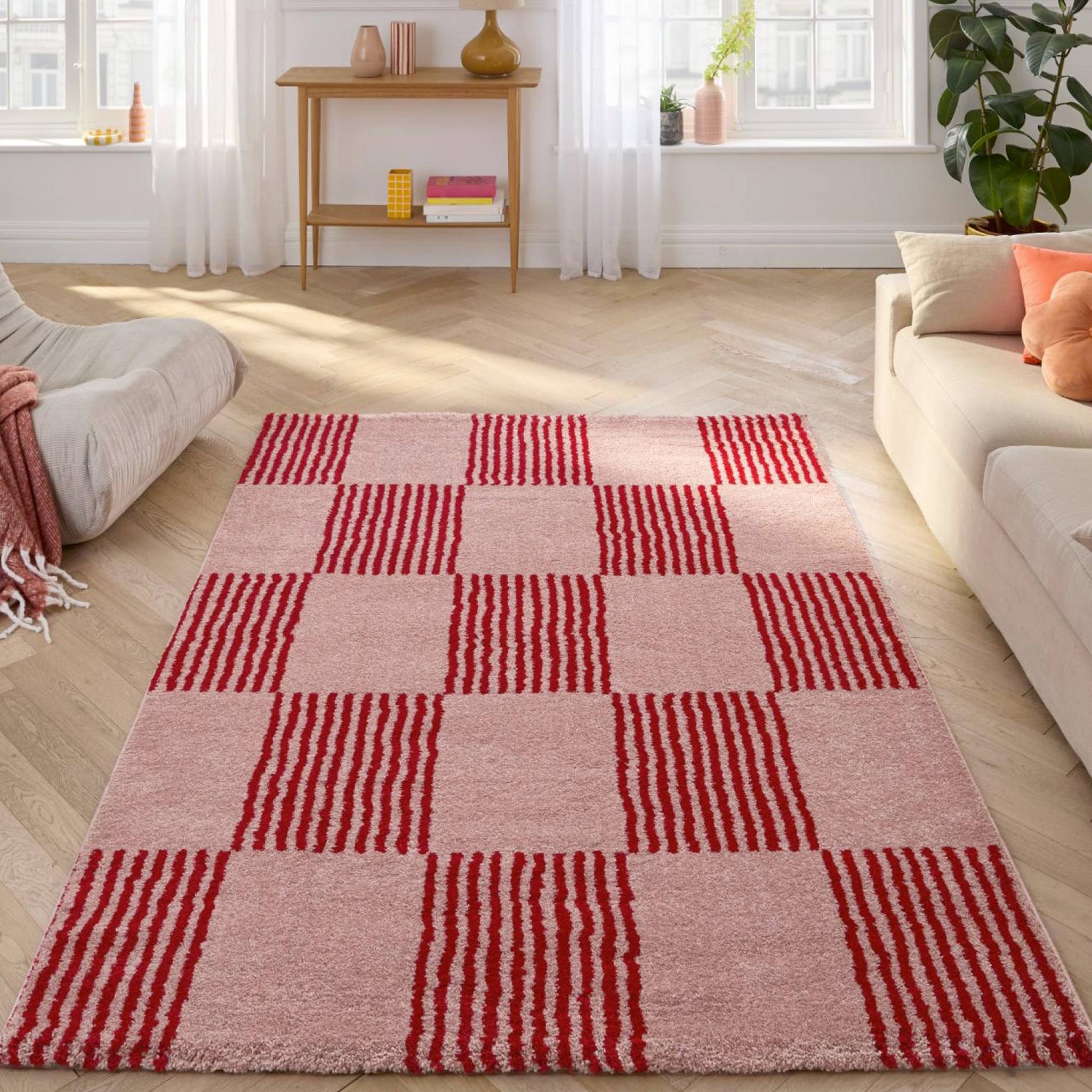 Tappeto interno a scacchi rosso e rosa