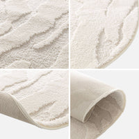 Tappeto interno a forma di ciottolo con rilievo crema, crema