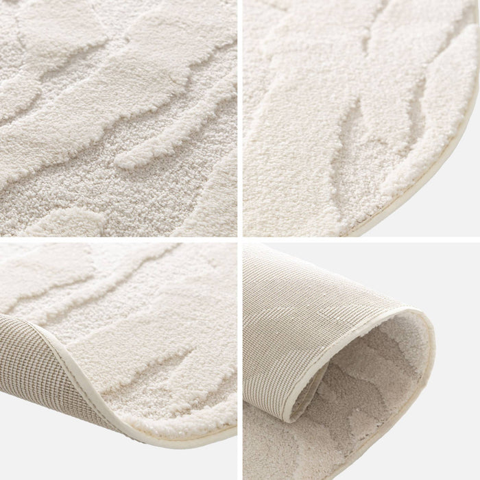 Tappeto interno a forma di ciottolo con rilievo crema, crema