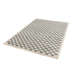 Tappeto a scacchiera di colore azzurro e crema