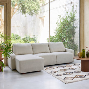 Divano angolare sinistro in tessuto semplice, 3 posti, grigio chiaro