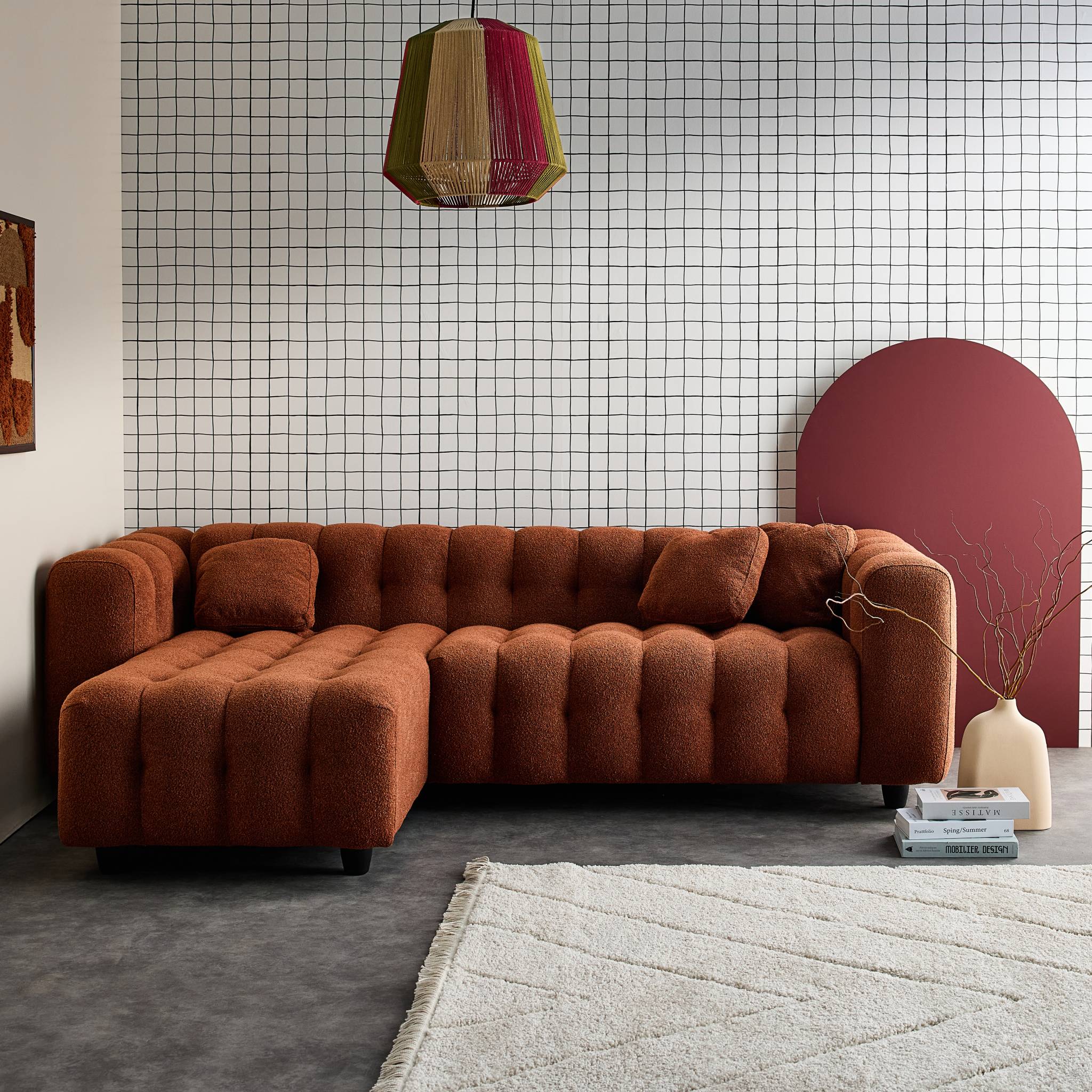 Divano angolare reversibile, in tessuto bouclé testurizzato,