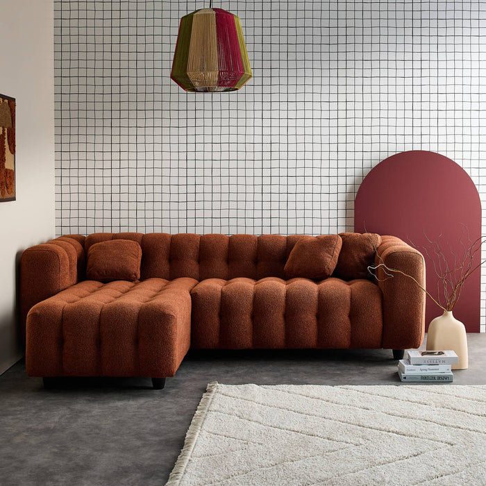 Divano angolare reversibile, in tessuto bouclé testurizzato,