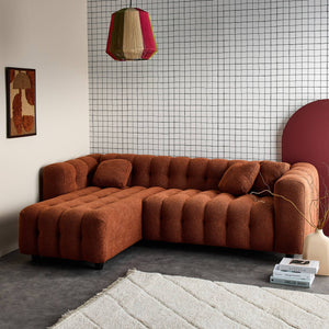 Divano angolare reversibile, in tessuto bouclé testurizzato,