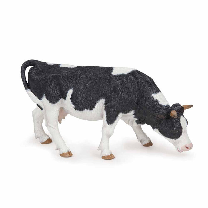 Papo - Black and white grazing cow