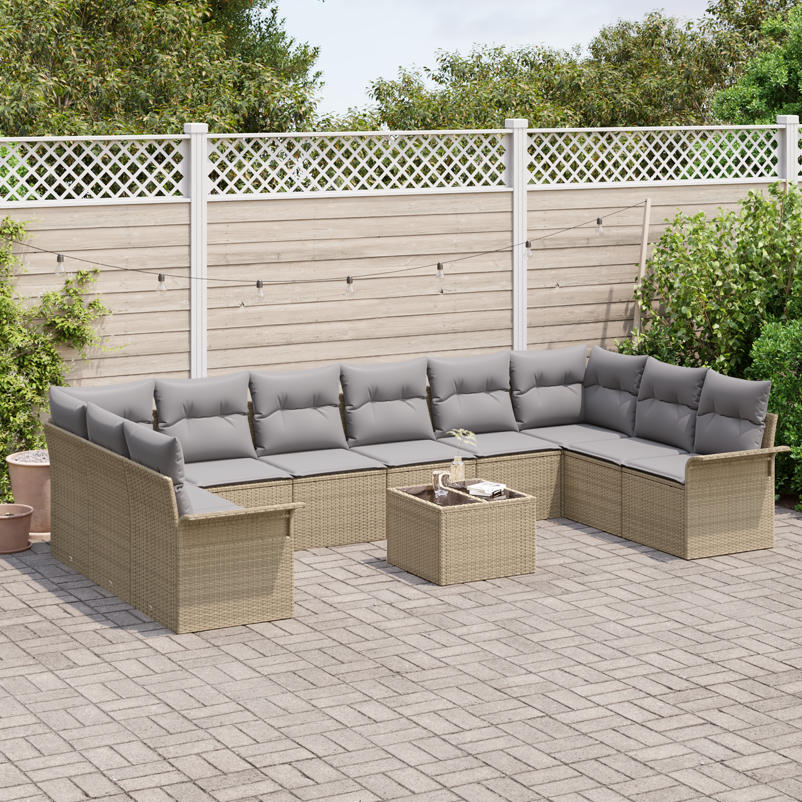Set di divani da giardino da 11 pezzi con cuscini in polyrattan nero