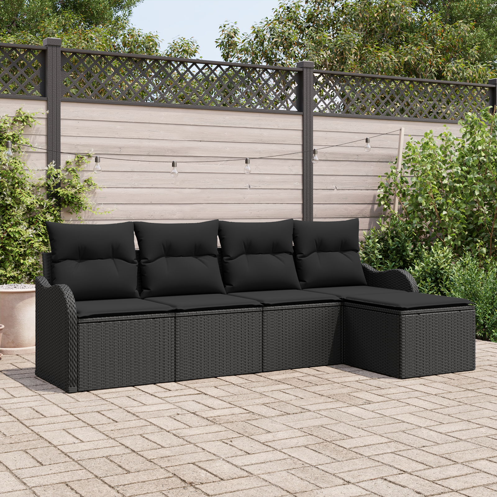 Set divani giardino  con cuscini neri in polyrattan