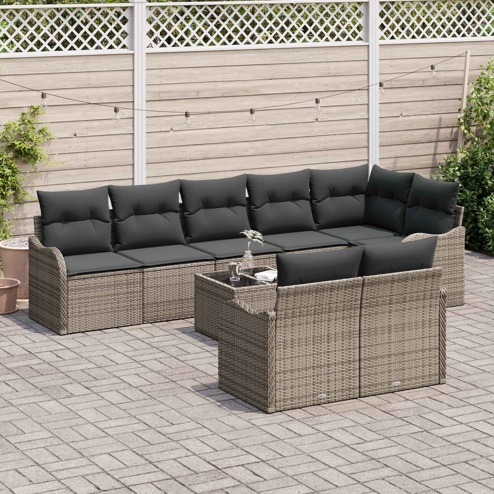 Set Divano da Giardino di 8 Pezzi con Cuscini in Polyrattan Nero