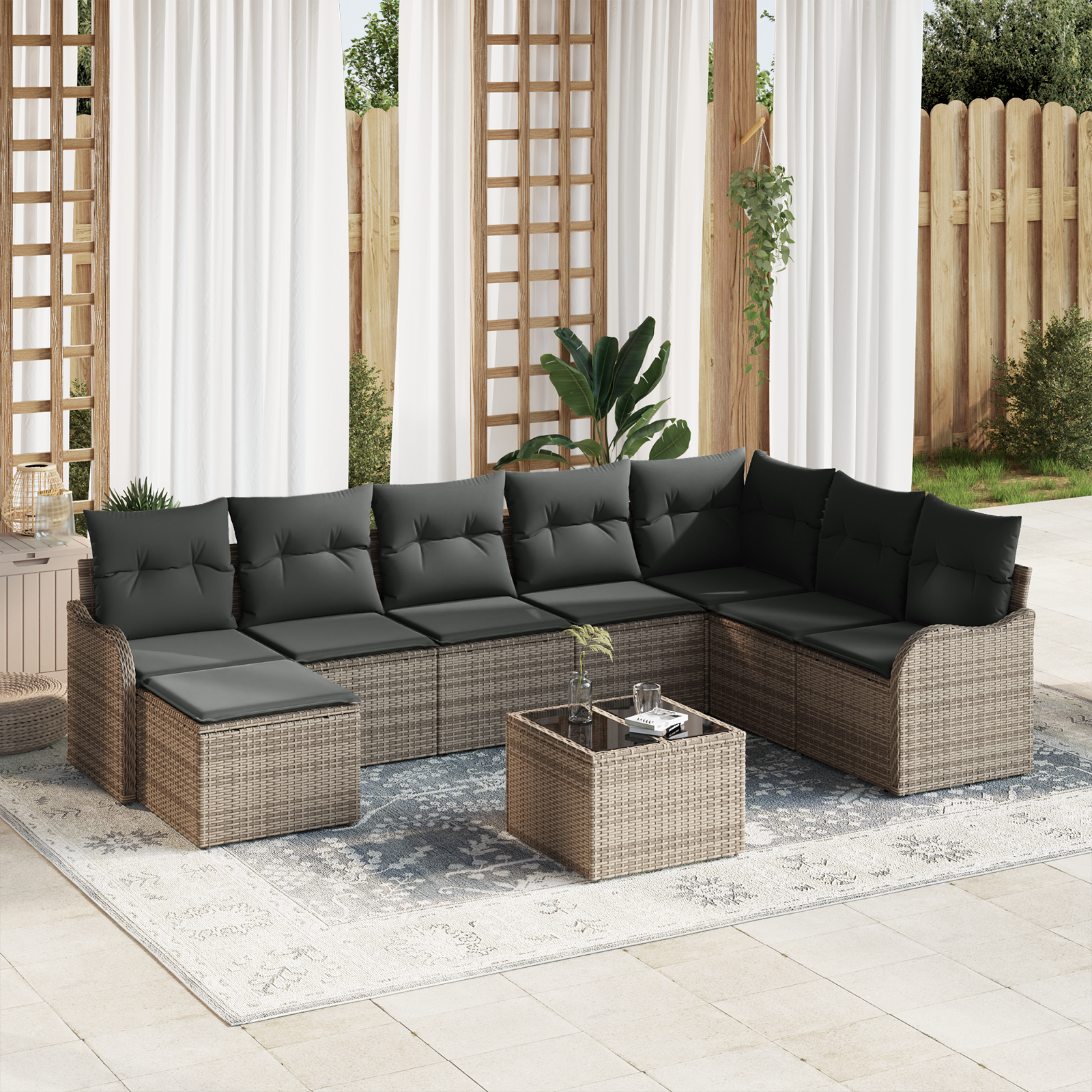 Set Divano da Giardino di 8 Pezzi con Cuscini in Rattan Nero Poly