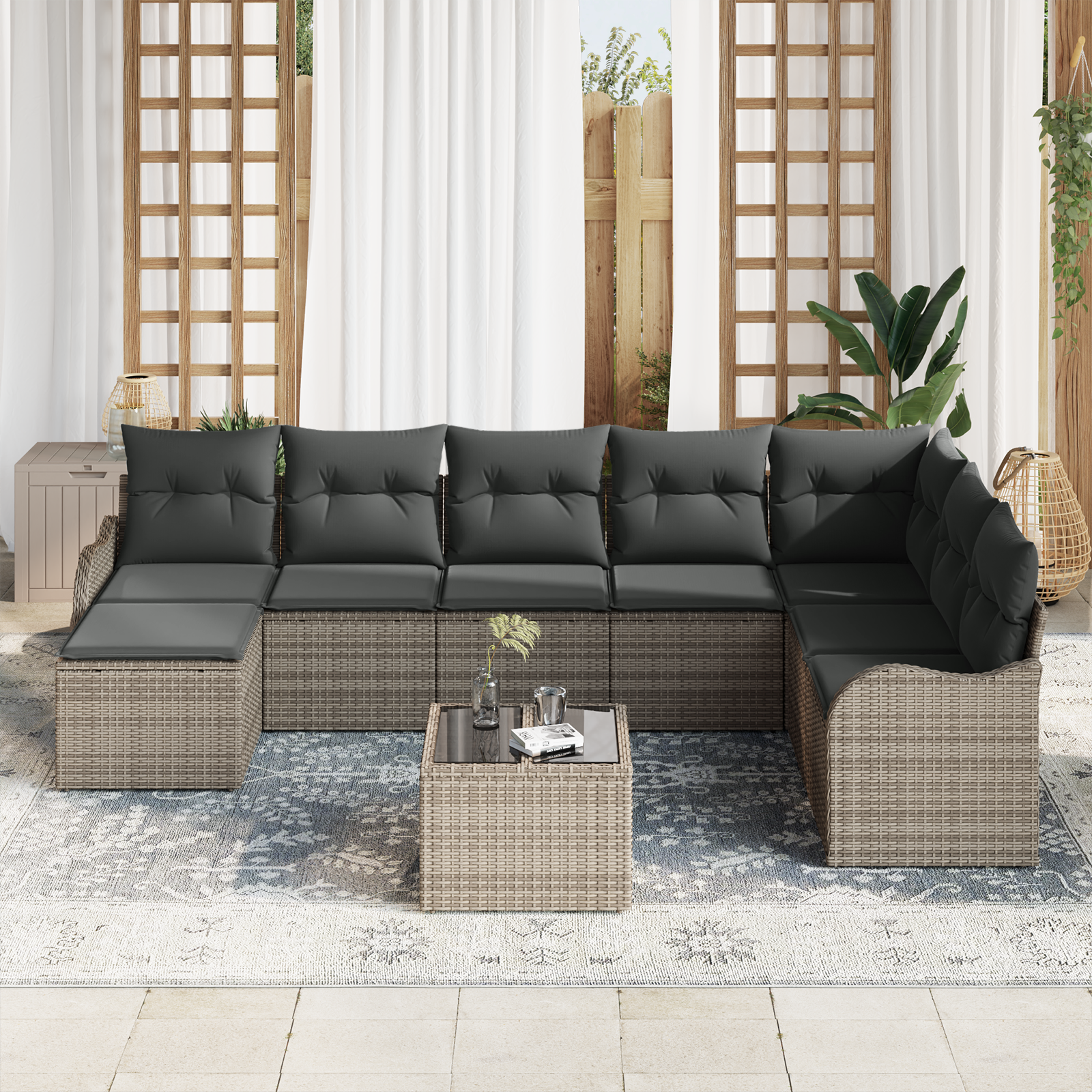 Set Divano da Giardino di 8 Pezzi con Cuscini in Rattan Nero Poly