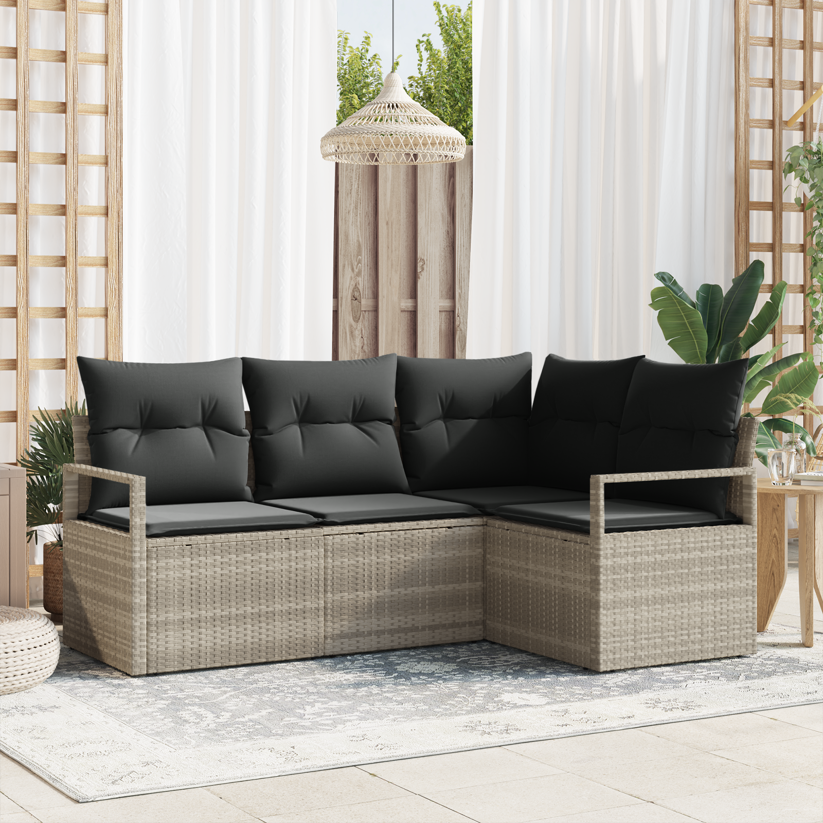 Set divano da giardino a 4 pezzi con cuscini grigio chiaro in polyrattan
