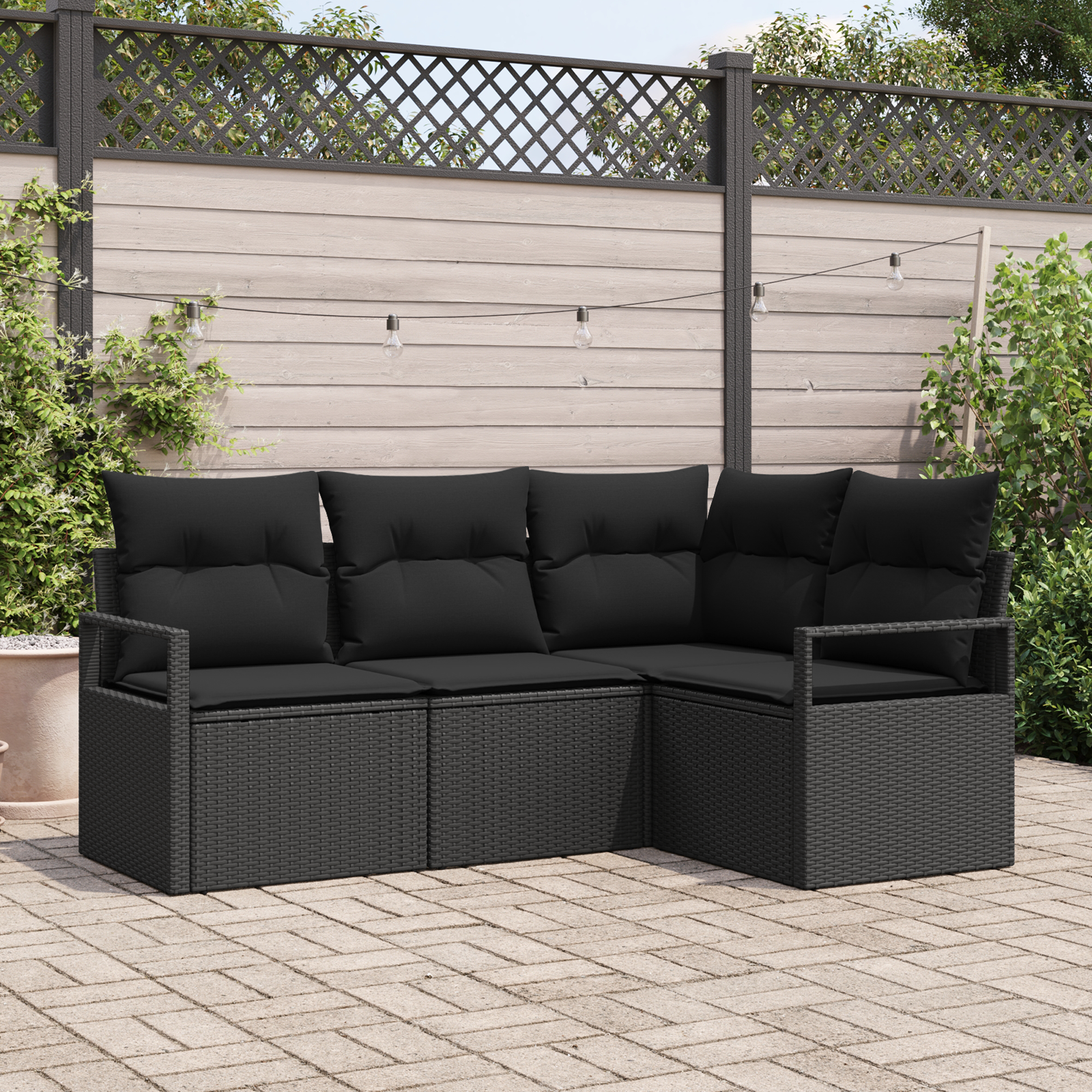 Set di divani da giardino 4 pezzi con cuscini neri in polyrattan